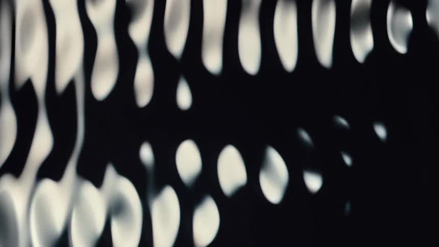 Water Cymatics, Abstract reflection of moving water expands and contracts