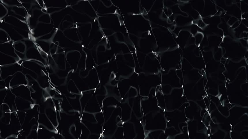 Water Cymatics, Abstract reflections of white light rippling across a dark surface
