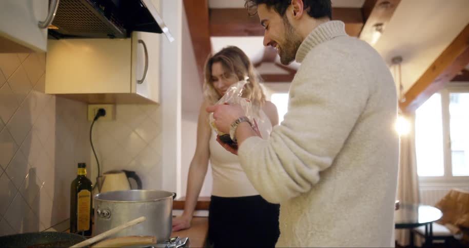 A footage of a couple cooking
