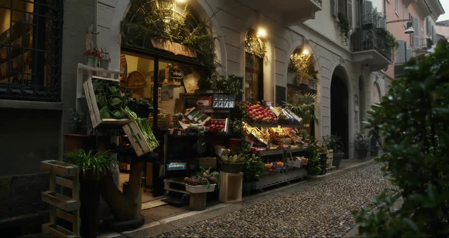 View of the outside of a grocery store in an urban corridor