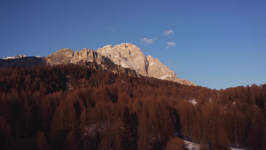 Aerial landscape of mountain ranges with conifers