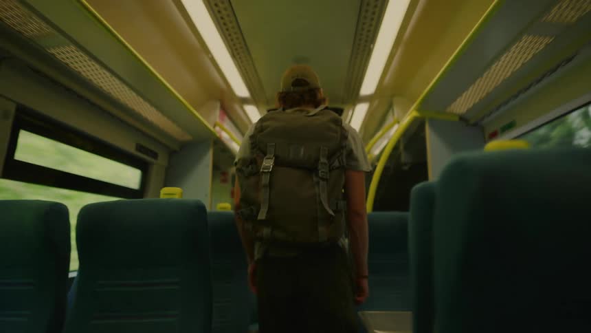 A footage of a person walking in the bus