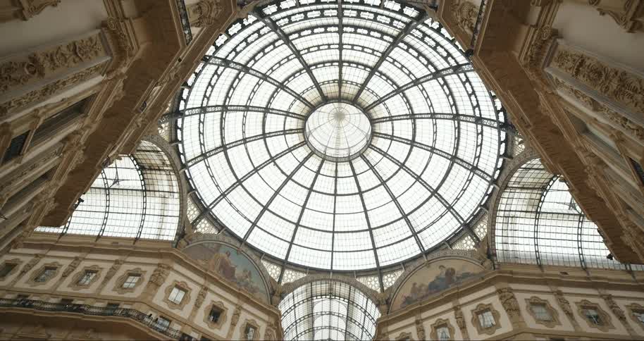 The intricate glass dome and ornate architecture of the galleria vittorio emanuele ii