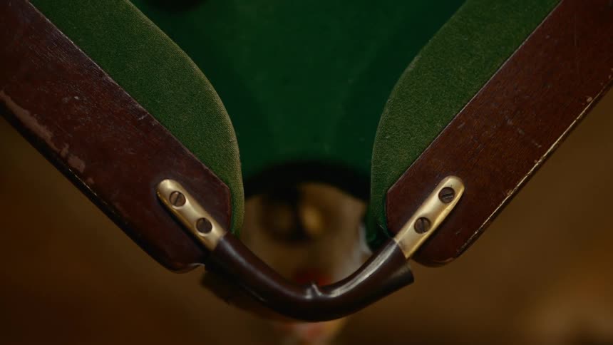 Cue ball pockets object ball into corner pocket