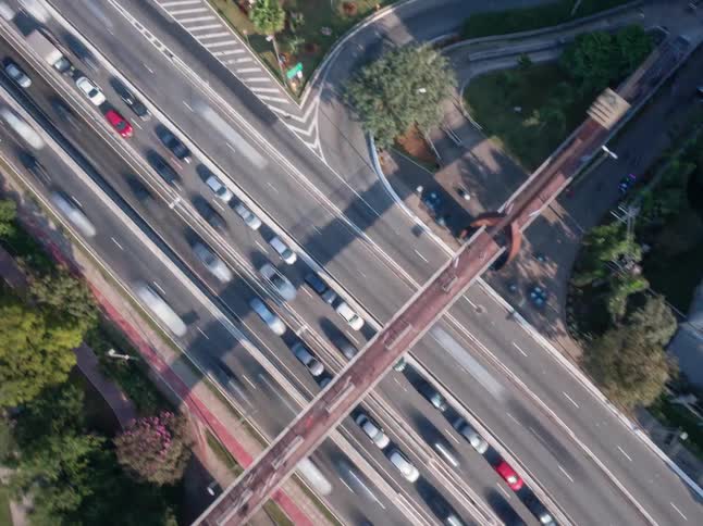Aerial view of intersections in a metropolis with heavy vehicle traffic
