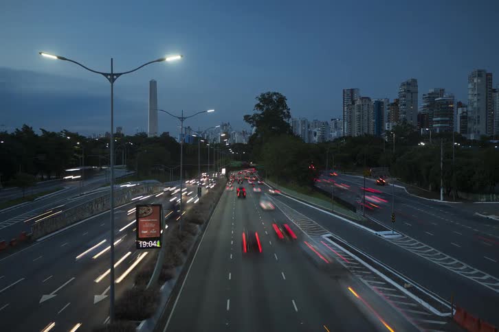 Heavy traffic is traveling on the freeway