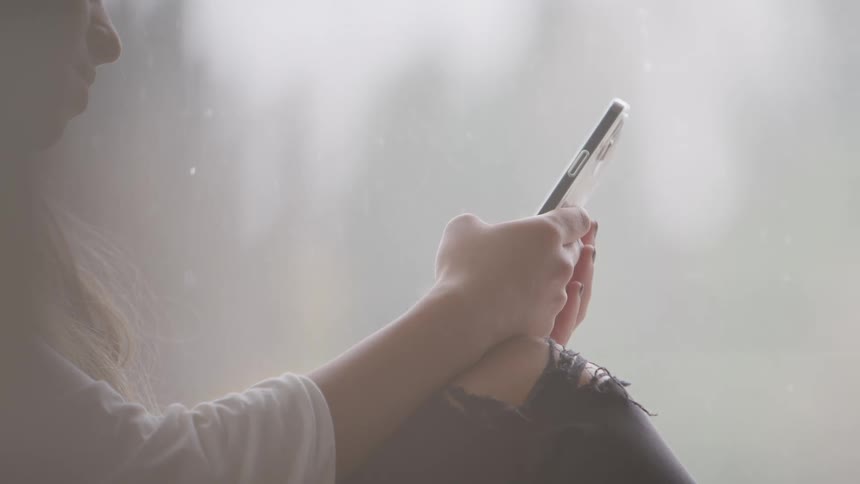 A clip of a person operating a phone