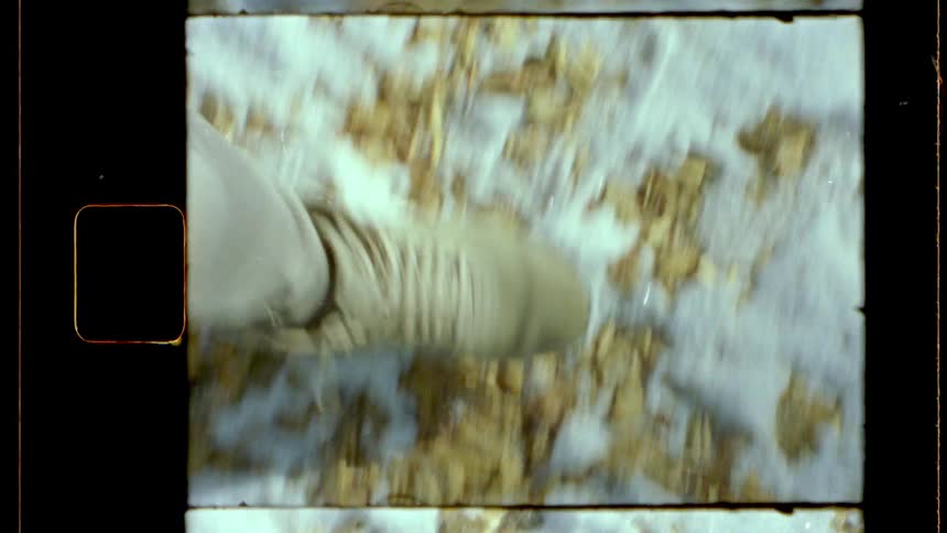 A footage of a person walking in the snow
