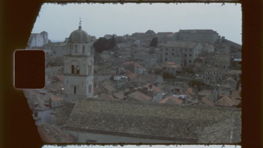 A village with many homes is on the shore