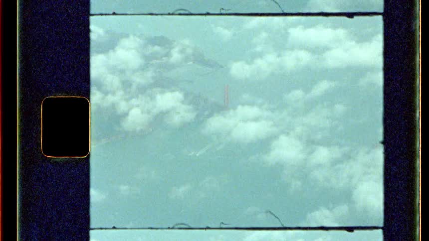 Aerial view of clouds and the golden gate bridge in the background