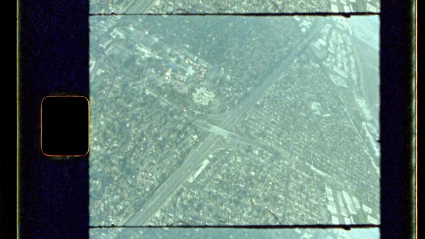 An aerial view of a major highway in a metropolitan city