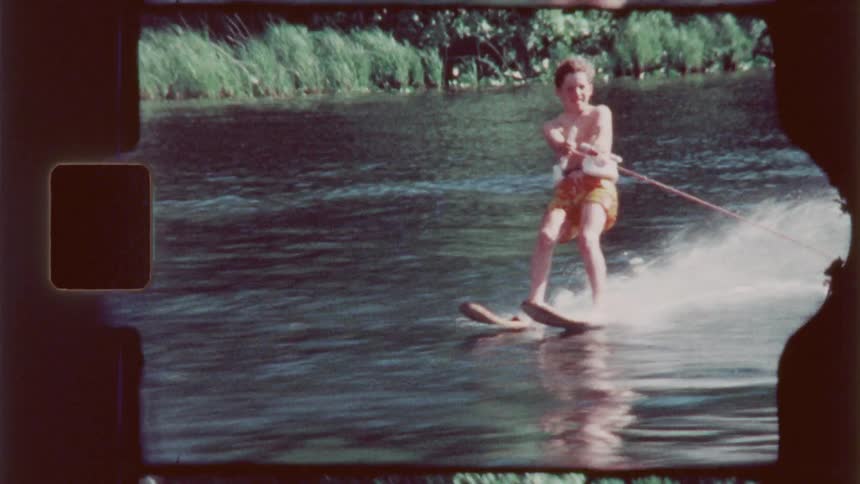 A film clip of a person surfing the sea