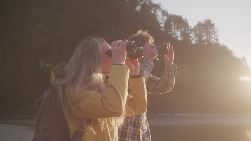 A footage of two people takin a photograph