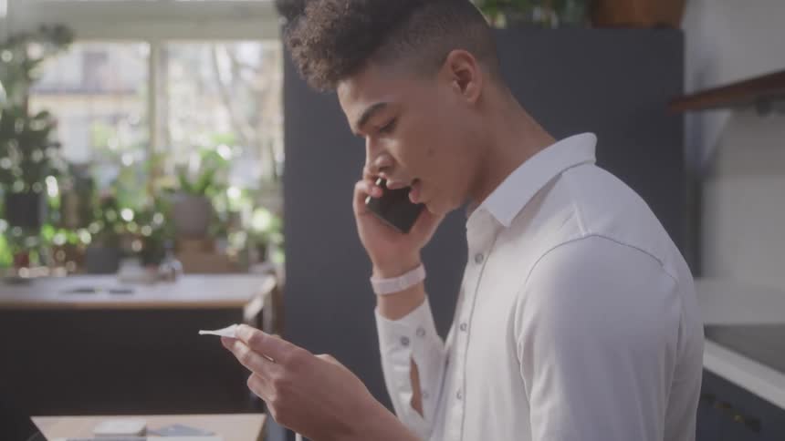 A footage of a person making a phone call