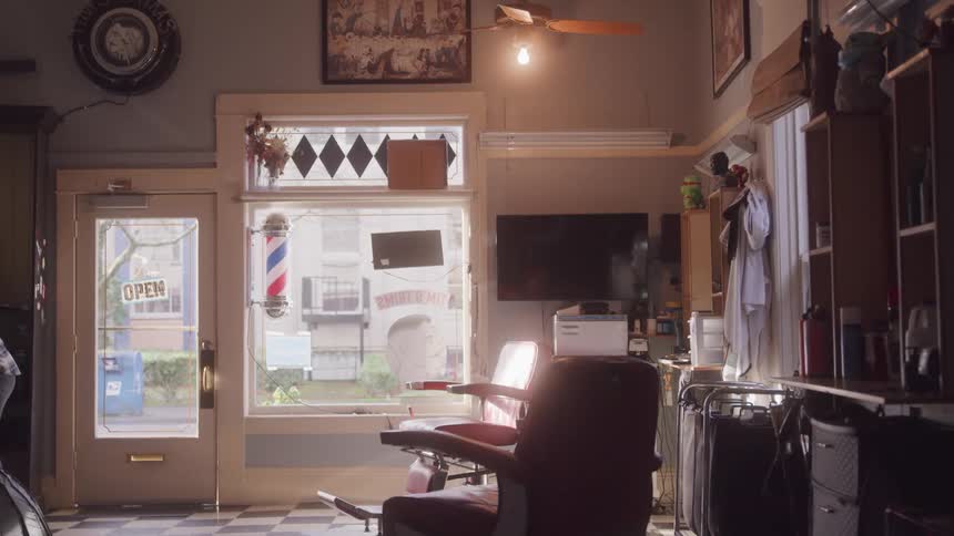 Interior view of a barber shop and a light turning on
