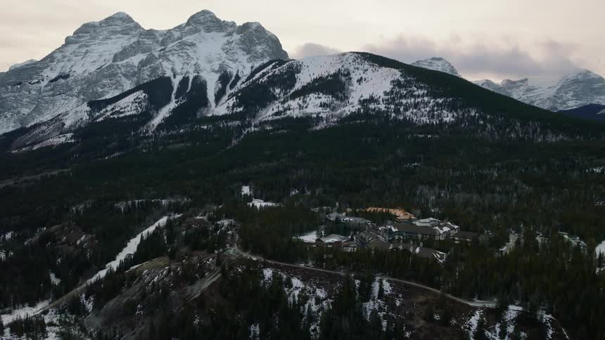 An aerial view of Kananaskis Village beneath Mt. Kidd