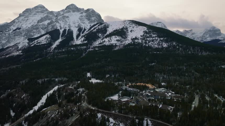Kananaskis Mountain village at dusk aerial view