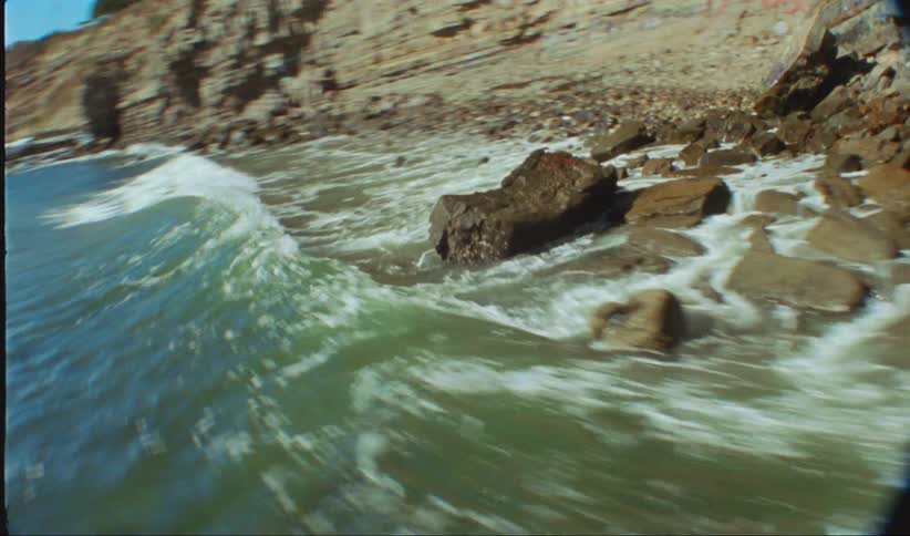 Strong waves are crashing on the shore