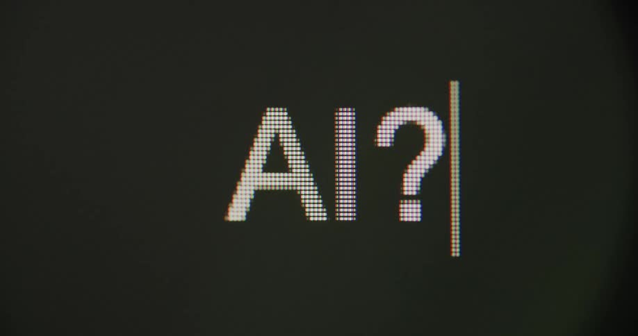 Letters and punctuation are flashing on a screen