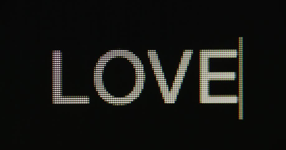 Close up of the word love being displayed on a screen