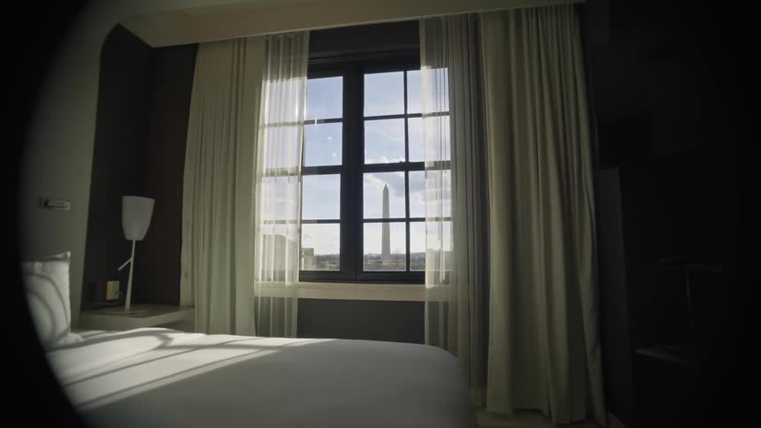 Interior view of a window with sunlight entering a room
