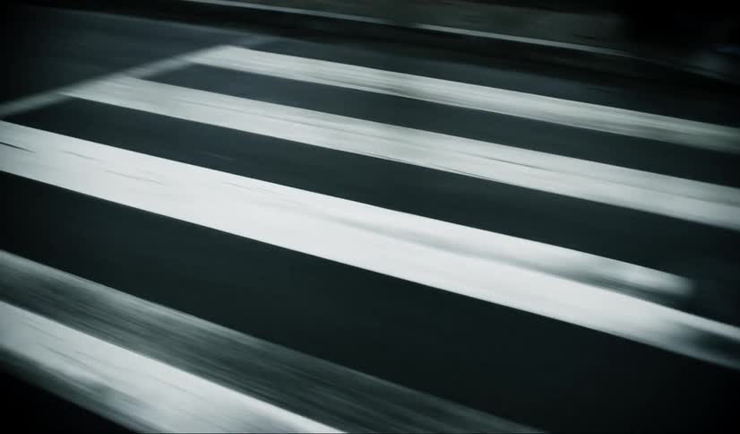 Lines and a crosswalk are seen on a road