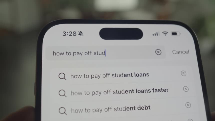Someone is typing into a search engine on their phone