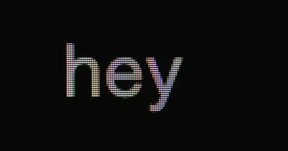 A word appears on a screen as a cursor moves