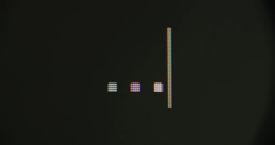 Three dots typed on a computer screen