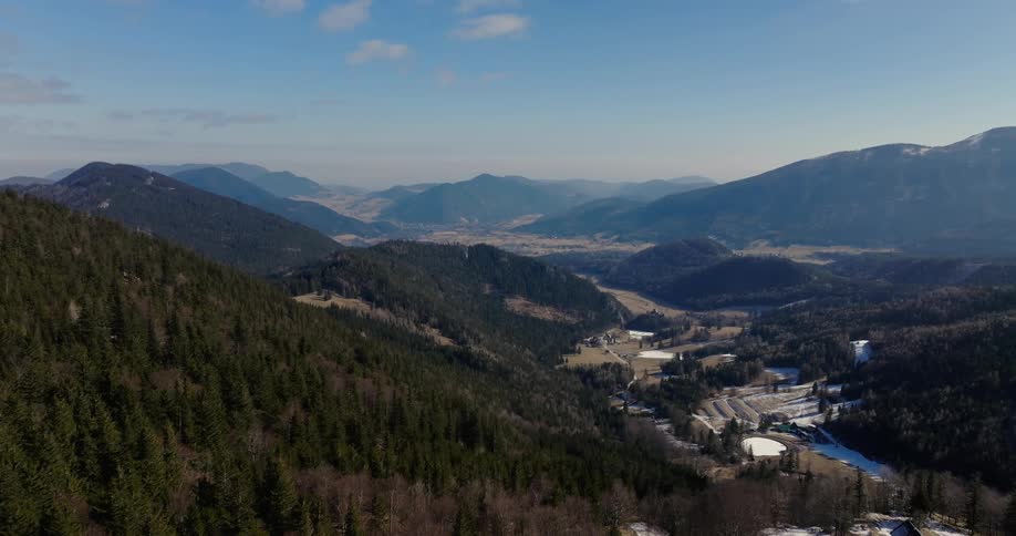 A farm is in the middle of the valley
