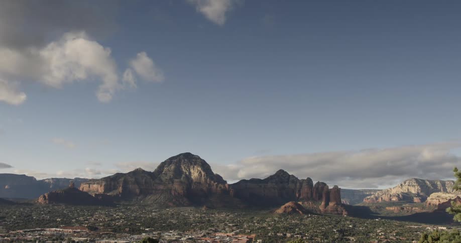 A higher view of mountains and the ground below