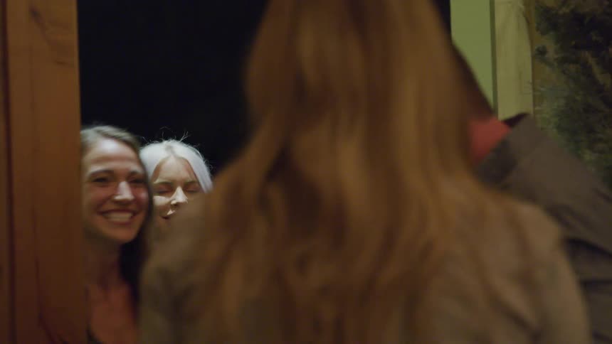 Man greeting a group of friends