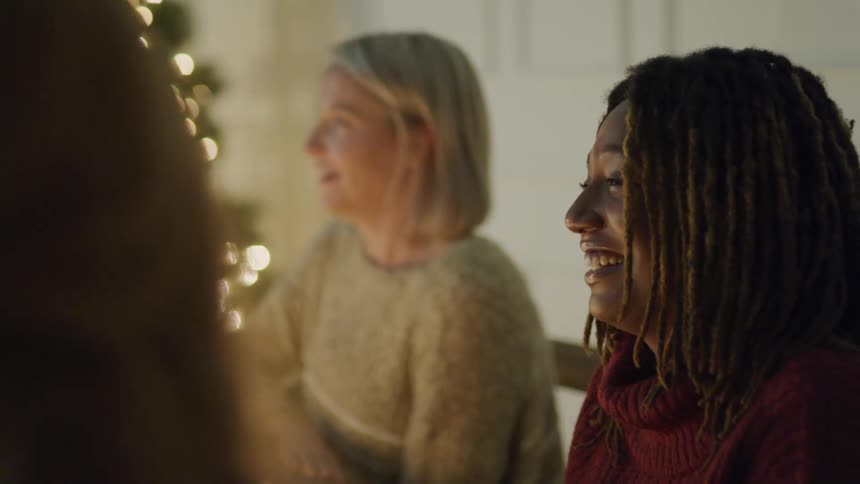 Happy women sitting at a dinner table