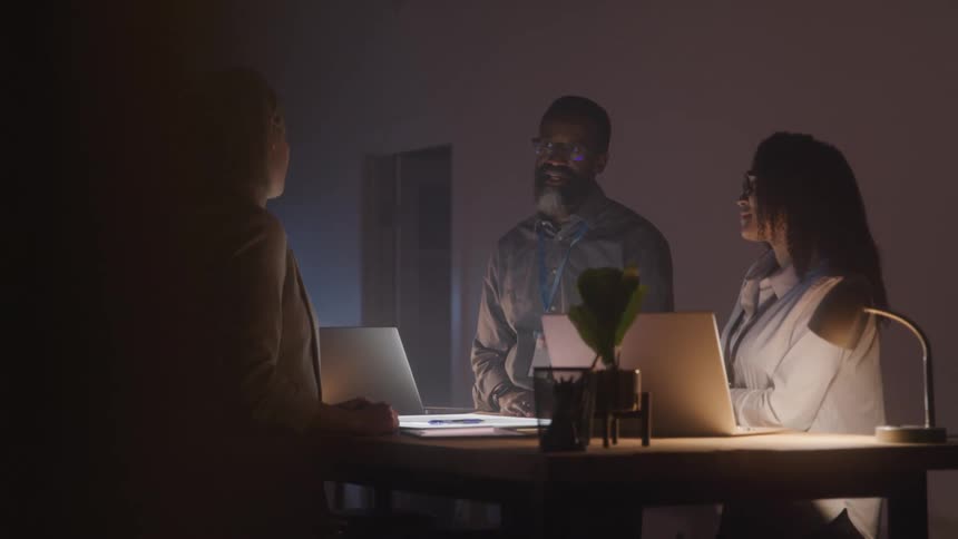 People are having a meeting in the office