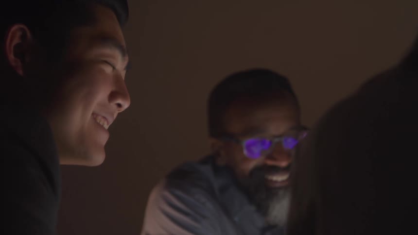 Men talk and laugh together
