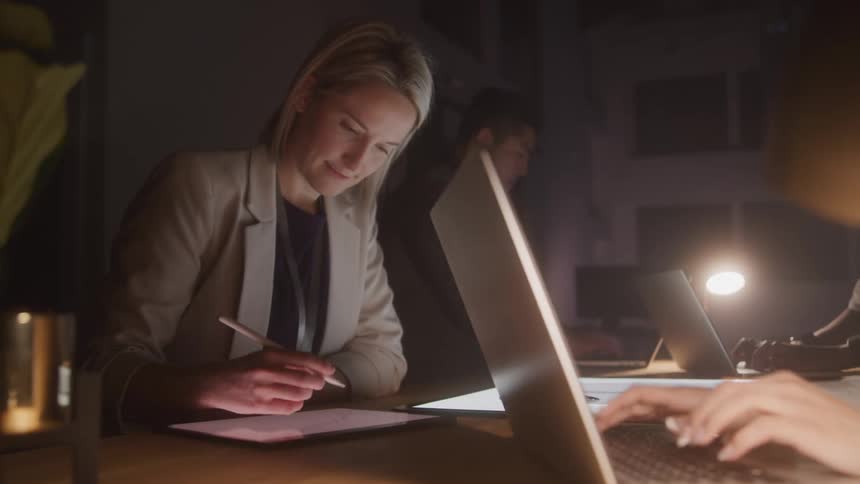 People are working on computers in the office