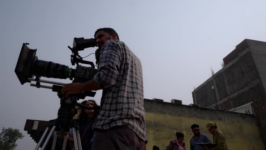 A footage of a cameraman filming