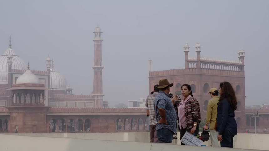 A family outside an historic mosque
