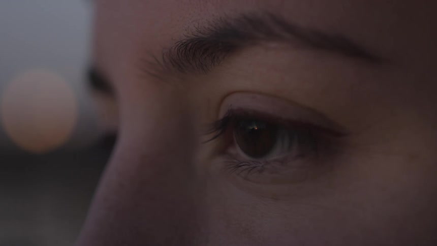 Close up of a persons eyes blinking