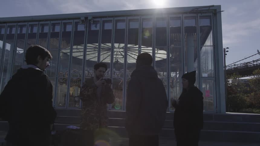 A footage of crew having a conversation outdoor