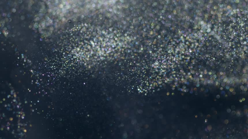 A spray of water flies around