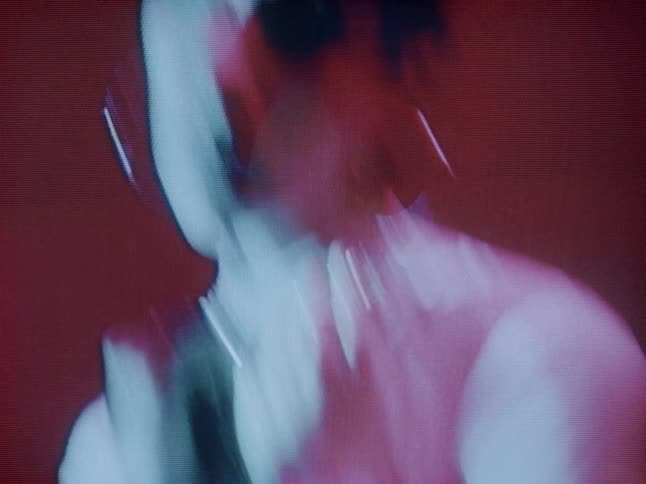 Blurred closeup of a young woman modeling