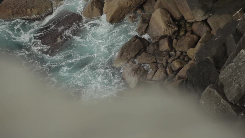 Waves crashing against rocks