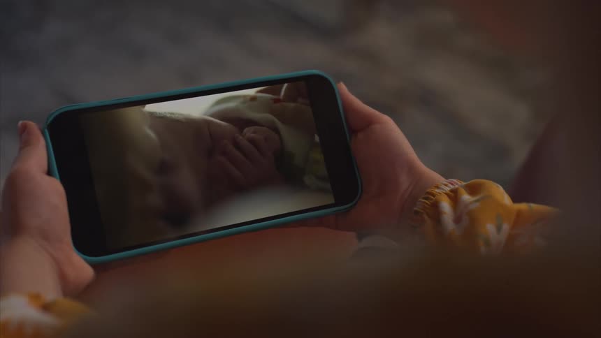 Pair of hands holding a smartphone