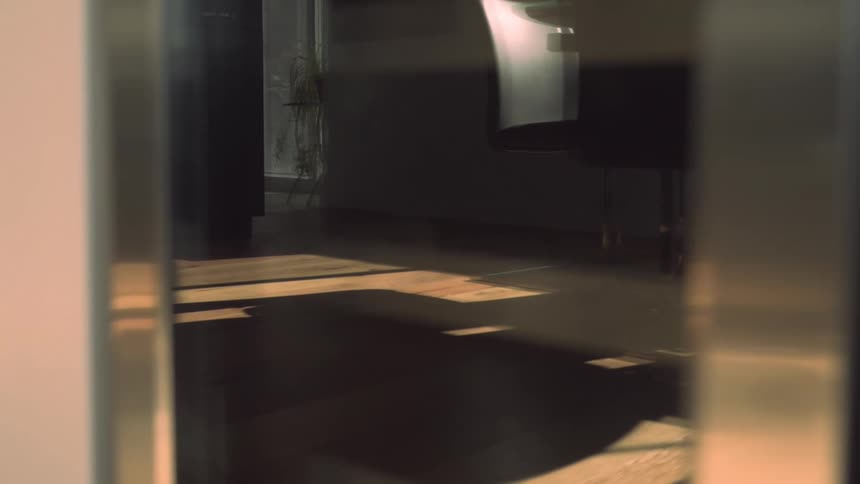 A child runs through the house
