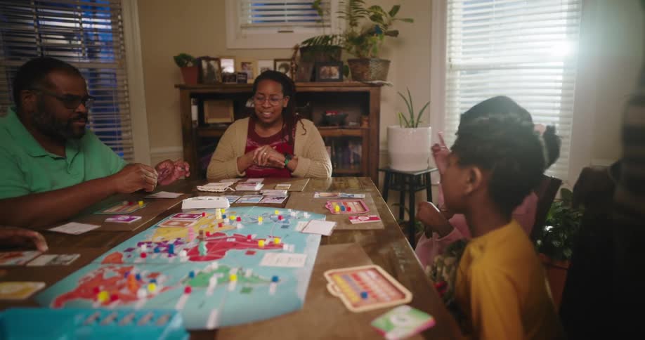 A family talk and play a board game