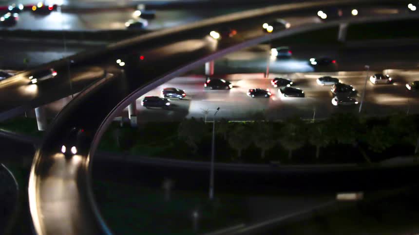 Cars rush along the highway