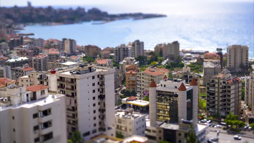 Heavy traffic drives through the coastal city