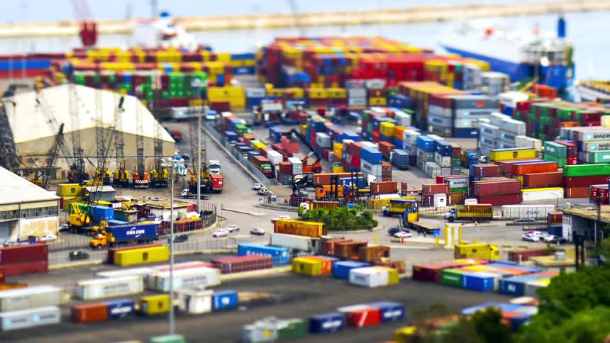 Panorama of a logistics port with vehicle and container traffic