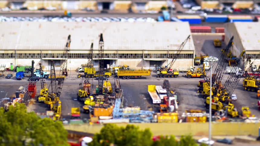 Construction equpment is seen at a business in a city